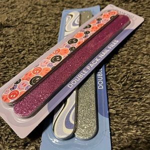 Set of 2 fingernail files, 2 per set. Very colorful and works great!